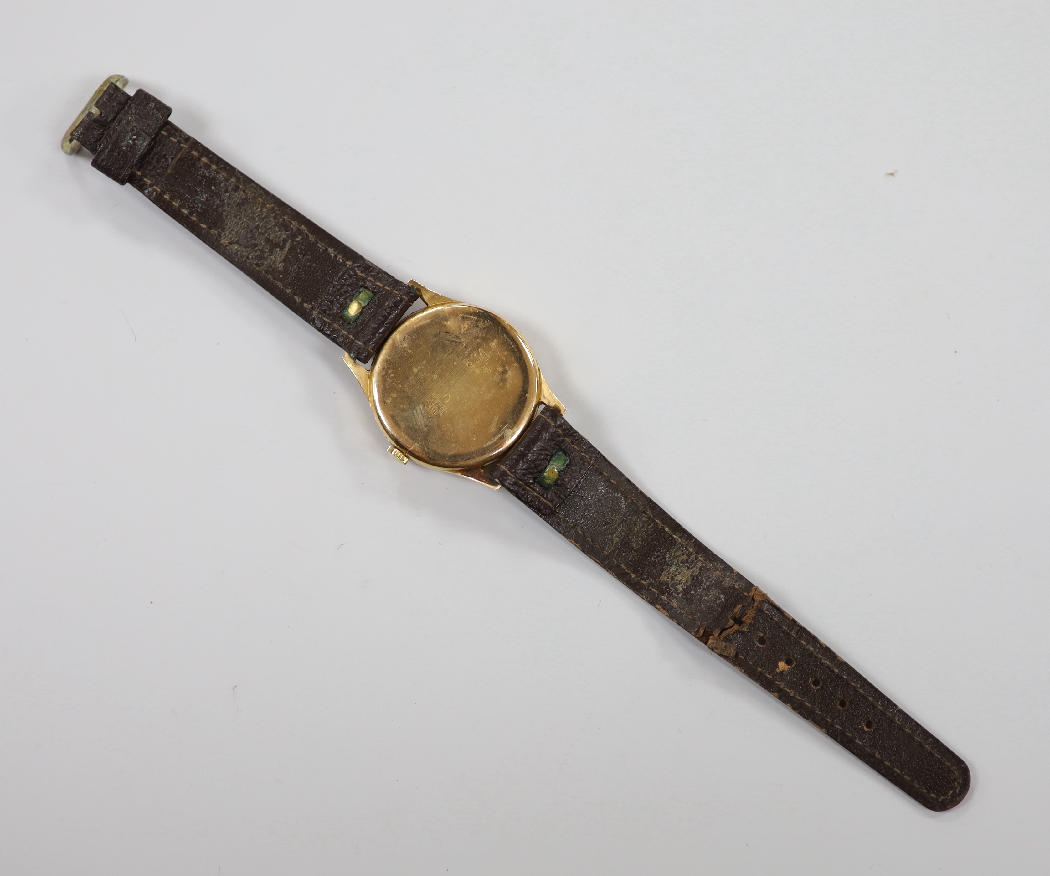 A gentleman's 1950's? 18k manual wind wrist watch, retailed by H. Moser & Cie, with subsidiary seconds, case diameter 36mm, on leather strap, gross weight 37.7 grams.